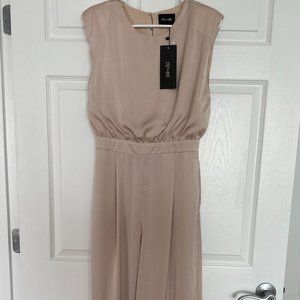 DO + BE Short Sleeve Shoulder Pad Jumpsuit Size Medium